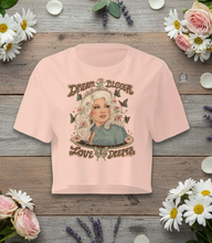 Load image into Gallery viewer, 🦋 “Wrapped in Dolly’s Wings” 🧚🏼‍♀️ Cropped Cotton Cutie Tee (pink or white) | 💛 Profits St. Jude’s Child Cancer Research